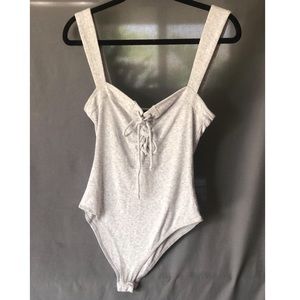 Grey bodysuit by Olivaceous